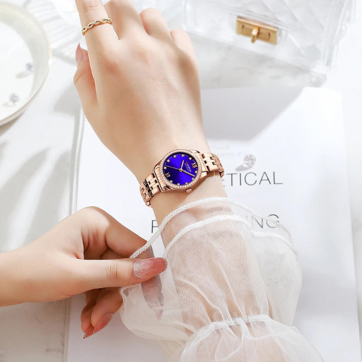 Women's Rhinestone Accented Quartz Watch with Sword-Shaped Pointer