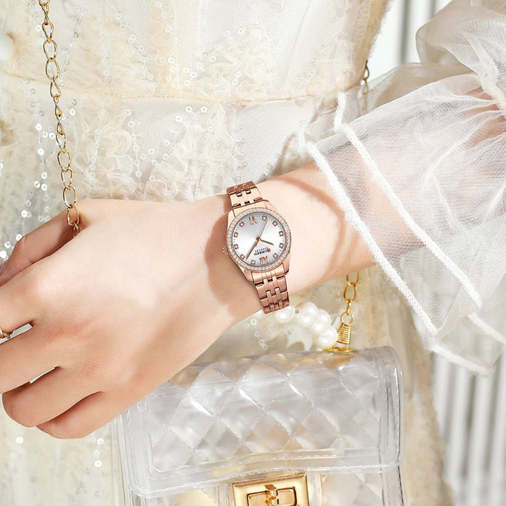 Women's Rhinestone Accented Quartz Watch with Sword-Shaped Pointer